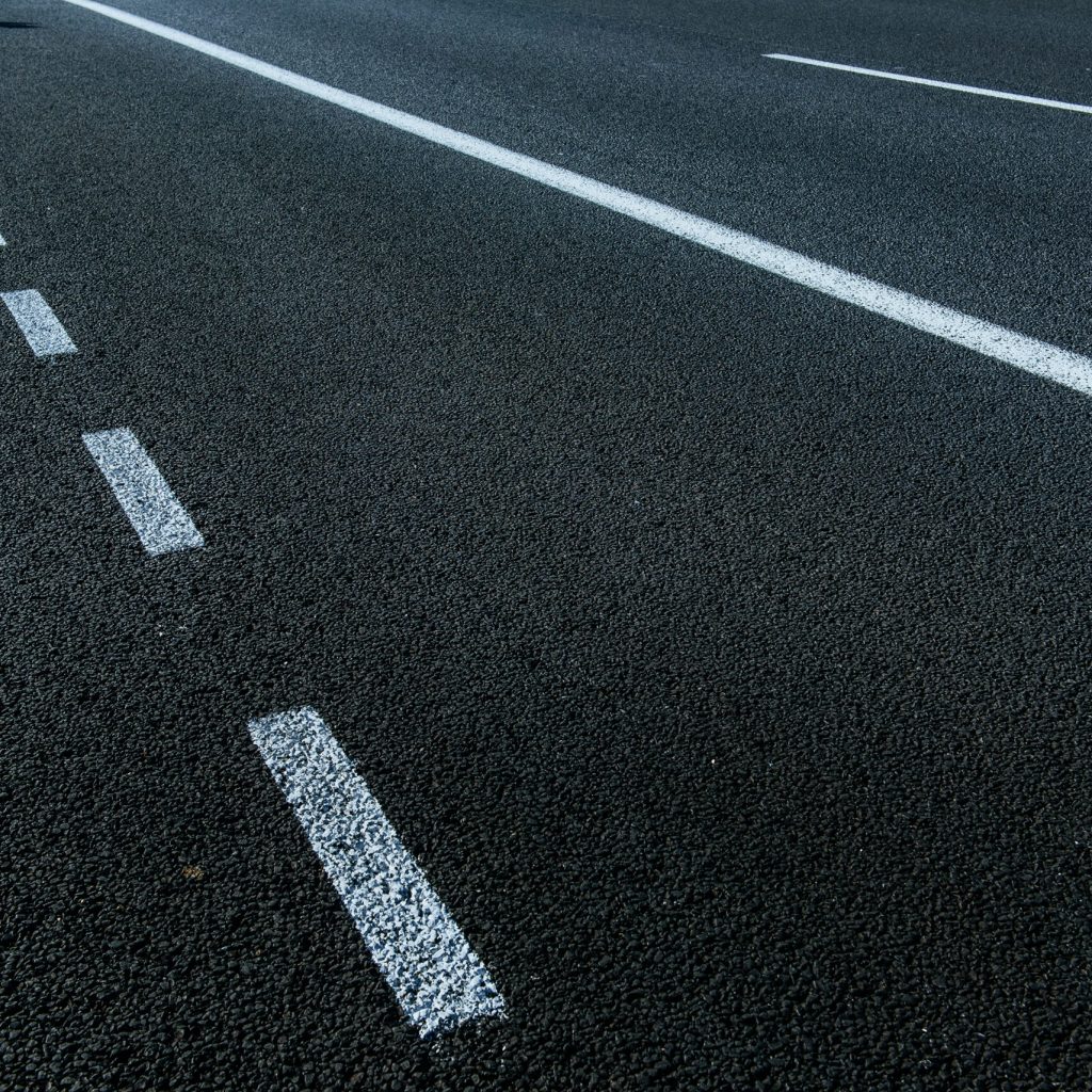 Asphalt Texture. New asphalt texture with white dashed line.